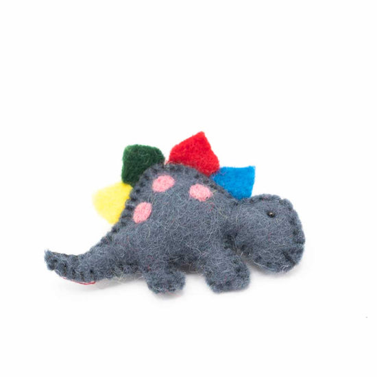 Load image into Gallery viewer, Grey felted stegosaurus brooch against a white background.
