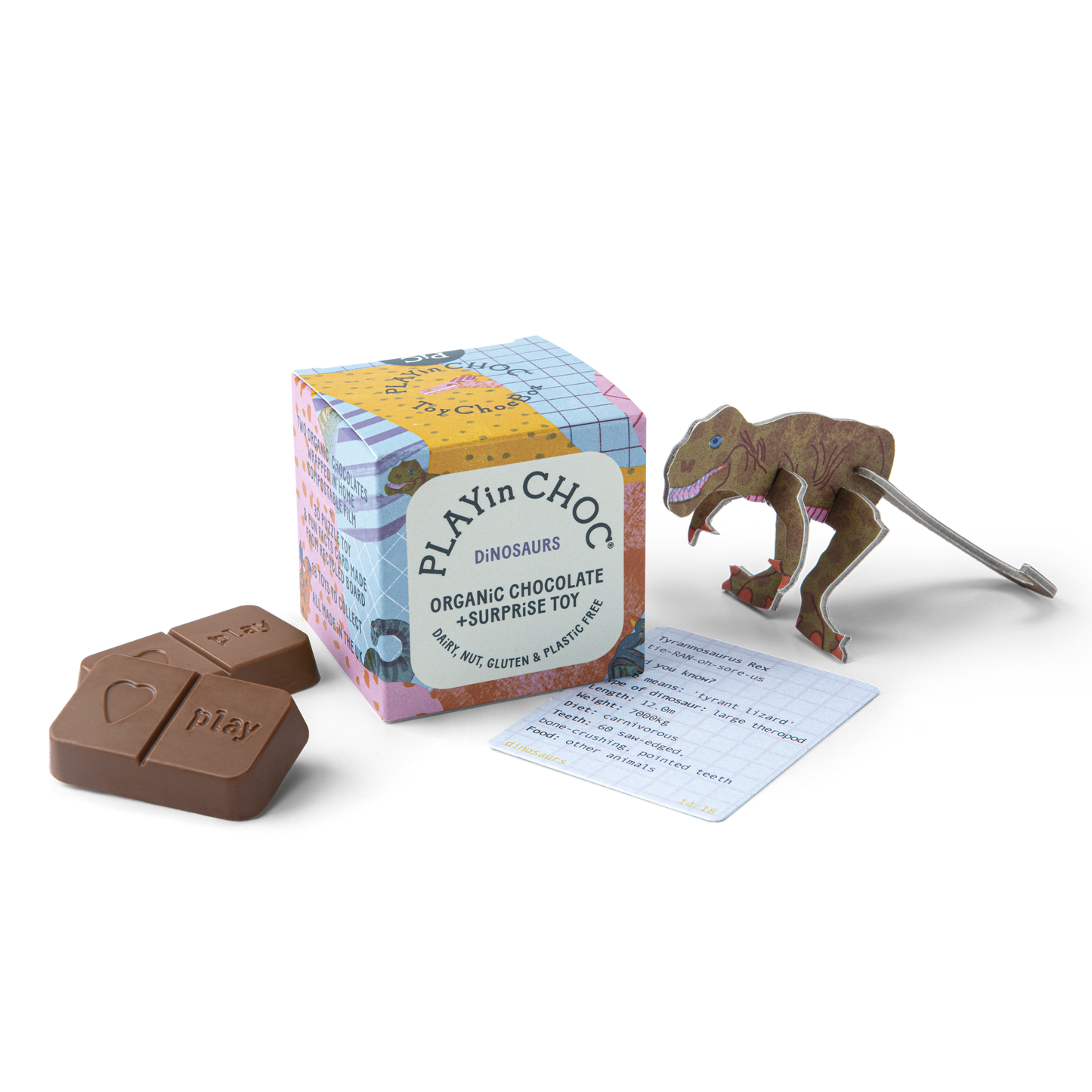 Playin Choc box centred against a white background.  A T. rex card figure has been assembled and is to the right of the box with the facts card right in front of it. The two chocolates of the box have been unwrapped and placed to the left of the box.
