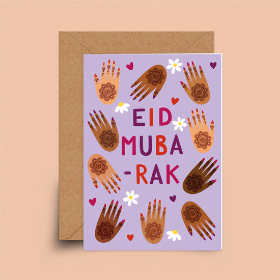 A pale purple card with lots of hands with henna decorations. In the middle in three shades of red and pruple the words, eid muba-rak, are written.