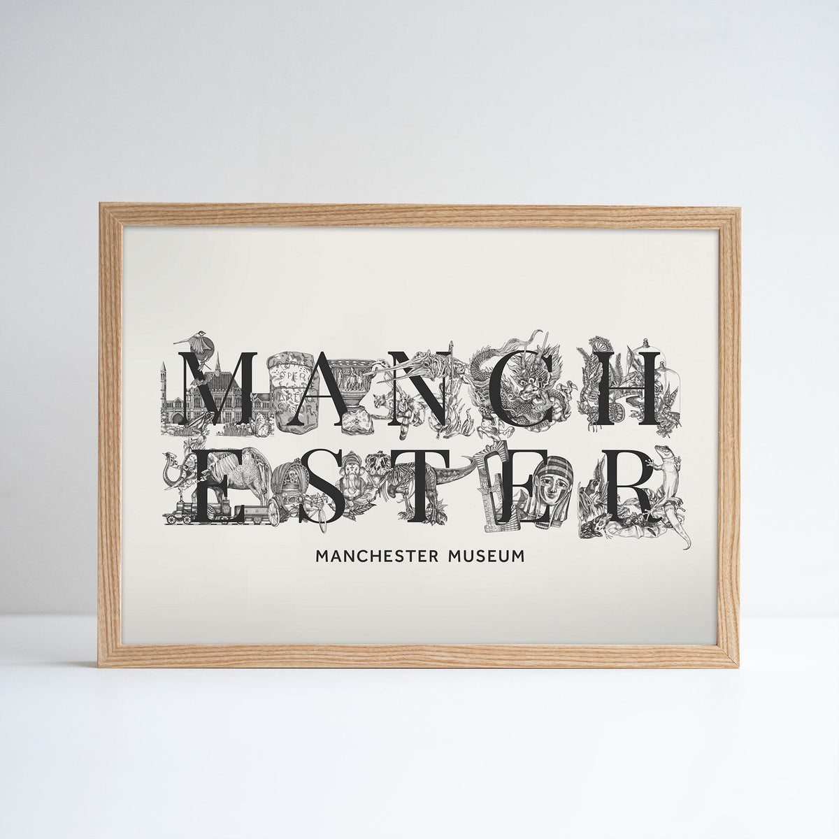 Natural ash wood coloured framed Manchester print with a few key illustrations from the museum tiles range behind or around each letter.