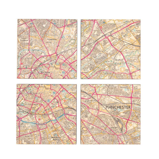 Load image into Gallery viewer, Four coasters with Manchester map design.
