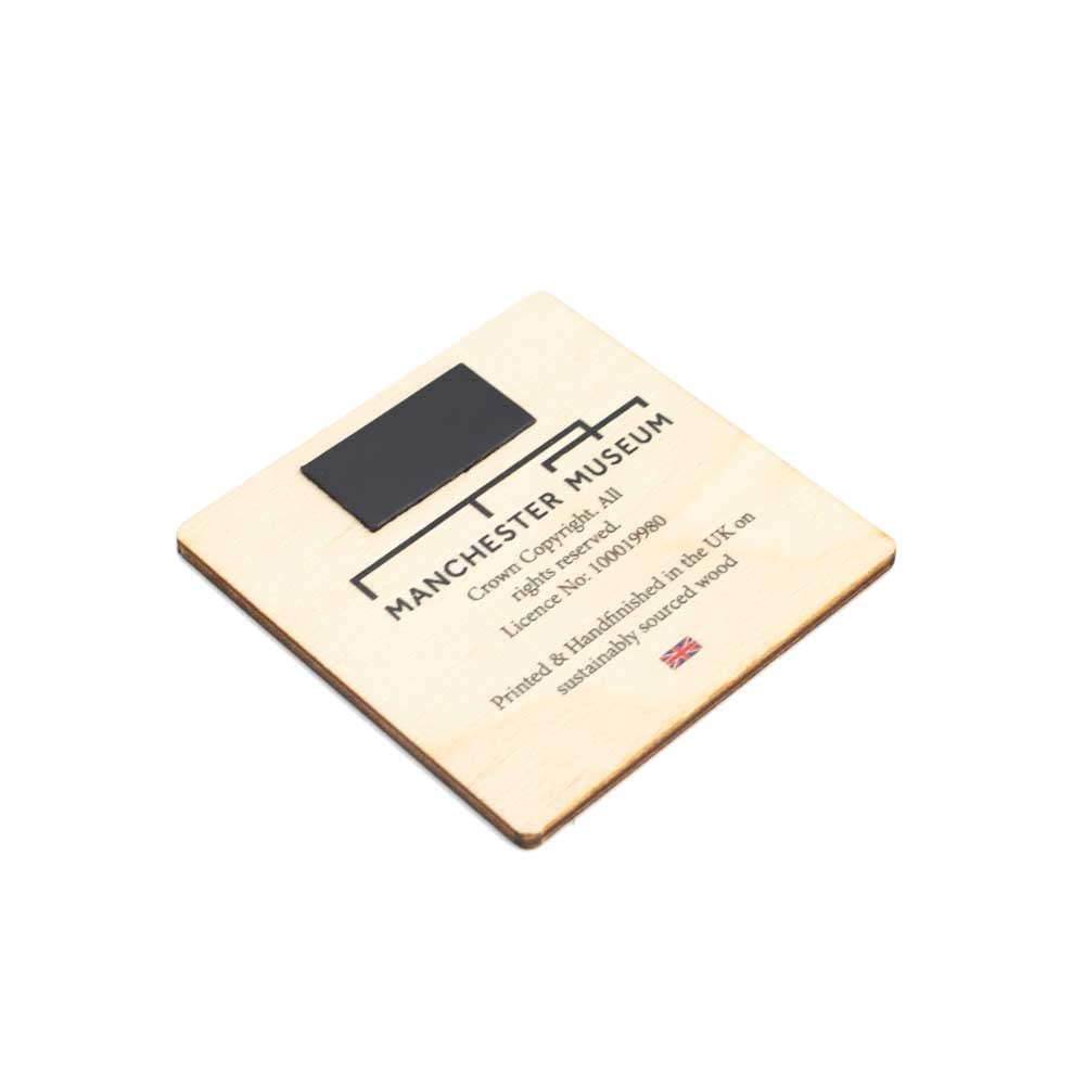 Reverse of hardwood square magnet with Manchester Museum banding