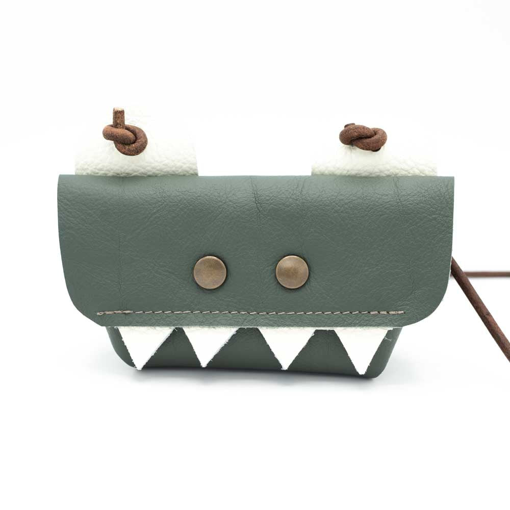 Front view of the dark sage green t-rex bag,