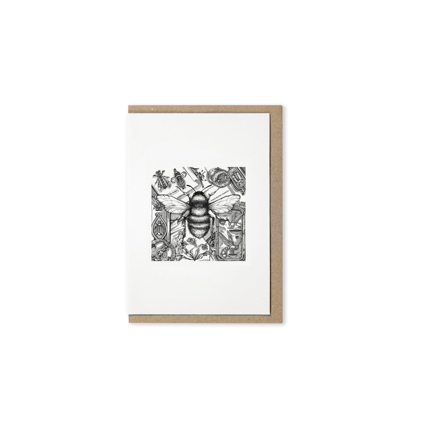 Museum bespoke bee design on a white card with a kraft paper envelope behind it.