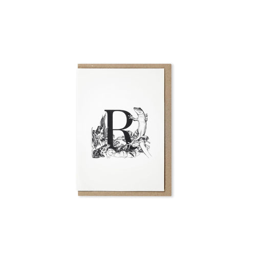 Letter R card with simplified rainforest illustration with a gecko in the front and frogs at the bottom and behind on the left.