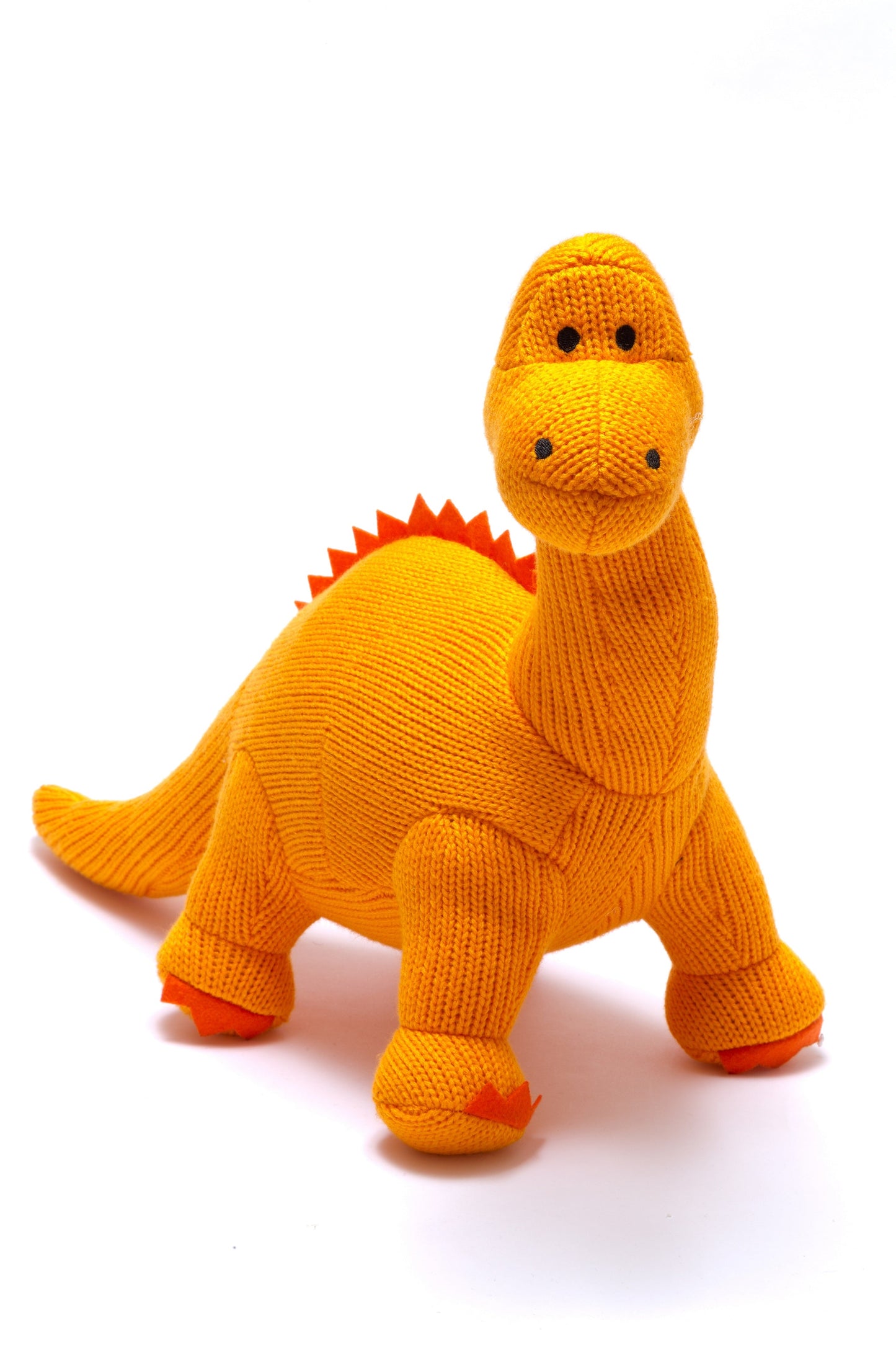 Orange diplodocus knitted plush toy.