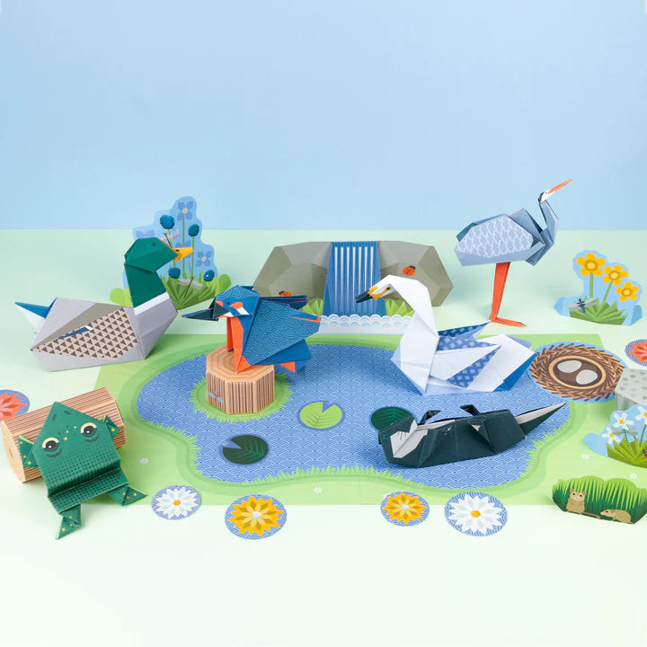 Lifestyle overview of the assembled wetland wildlife origami kit.
