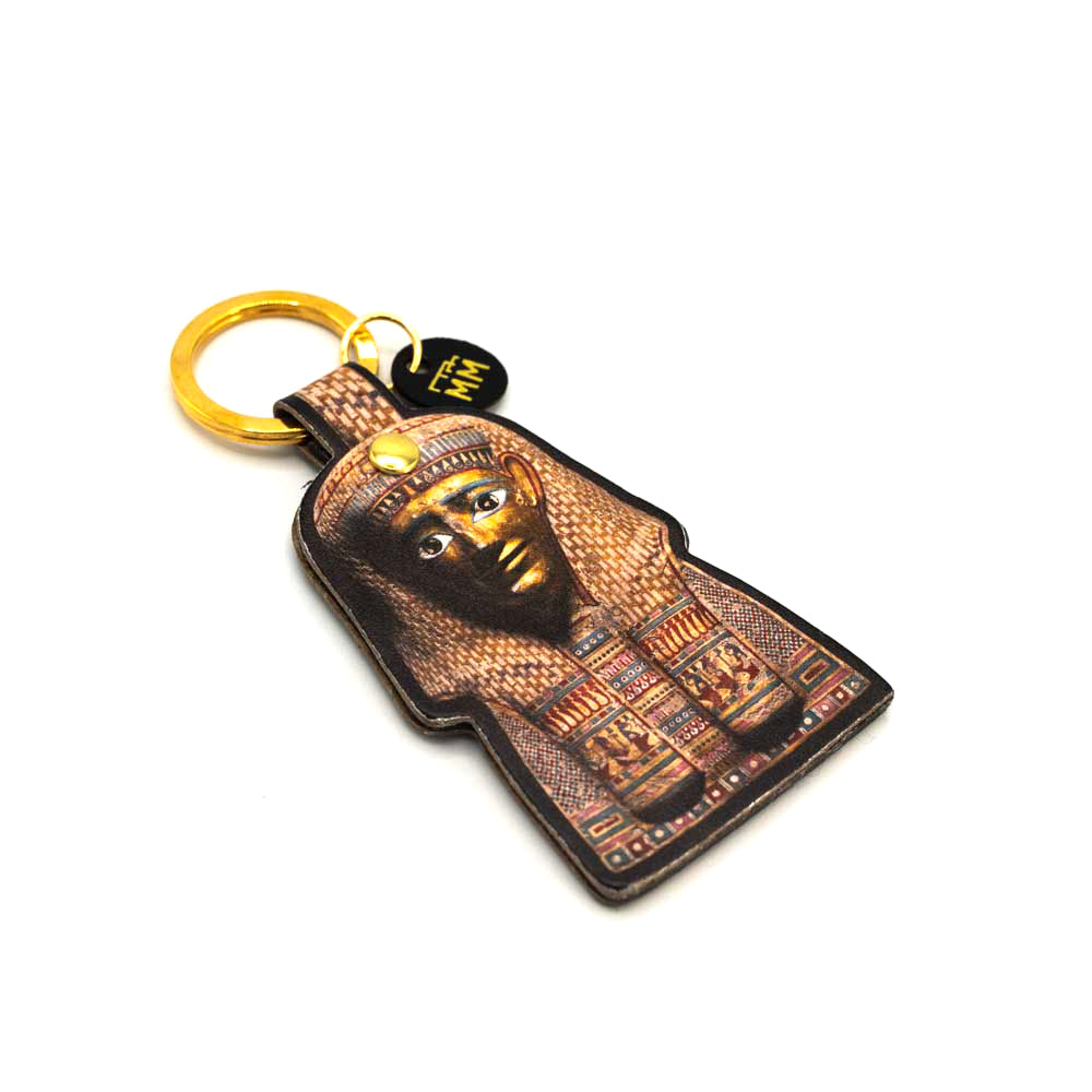 Load image into Gallery viewer, Slightly angled side view of burial mask photograph keyring. The ring is golden. of burial mask photograph keyring. The ring is golden.
