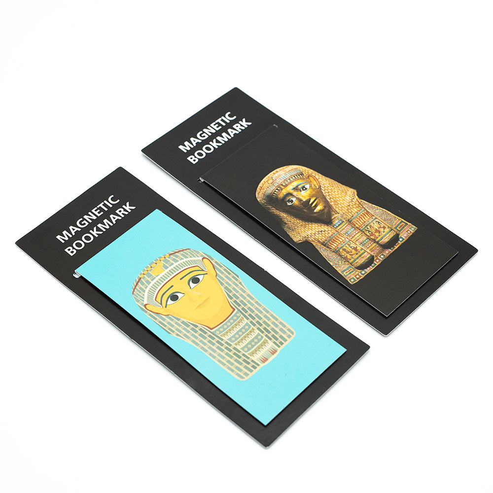 Load image into Gallery viewer, Black bookmark with photopgraph of Golden Mummies burial mask side by side with the turquoise burial mask illustration bookmark.
