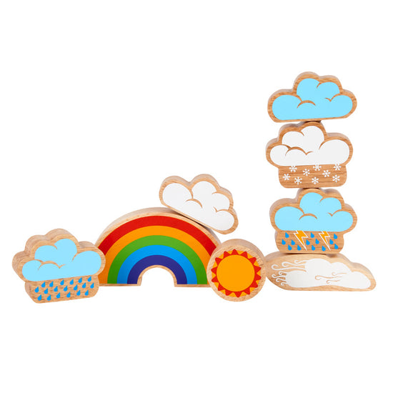 The weather playset with blue and white clouds stacked fice high on the right and another white could resting on the rainbow next to the stack. A blue rain cloud is to the left of the rainbow and the round sun in front.