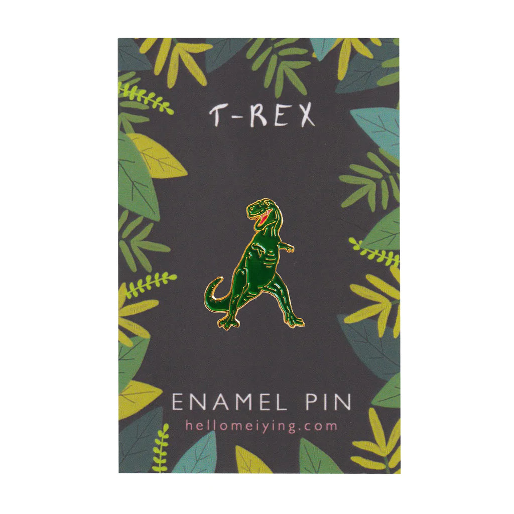 Tyrannosaurus pin on the dark green backing card.